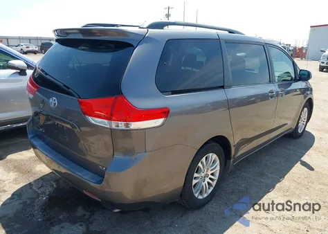 2011 Toyota Sienna Xle V6 z USA, uszkodzony, nr VIN 5TDYK3DCXBS143010